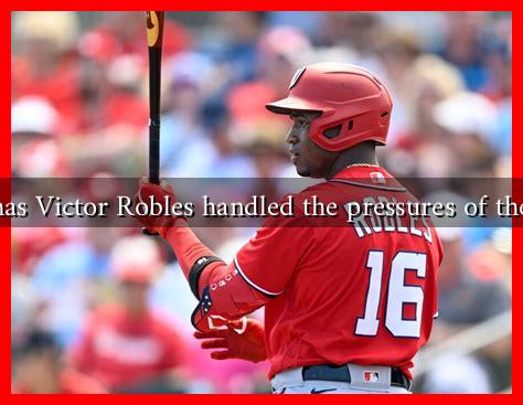 How has Victor Robles handled the pressures of the MLB