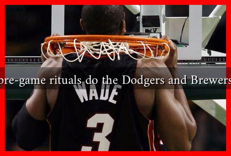 What pre-game rituals do the Dodgers and Brewers have?