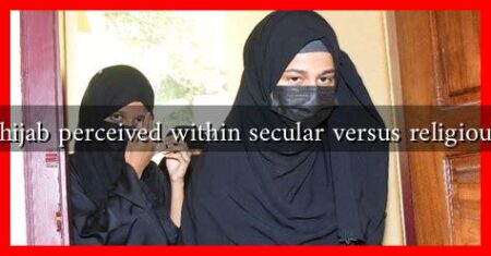 How is the hijab perceived within secular versus religious countries?