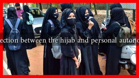What is the connection between the hijab and personal autonomy in feminism?