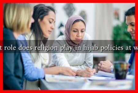 What role does religion play in hijab policies at work?