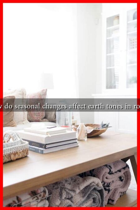 How do seasonal changes affect earth tones in rooms